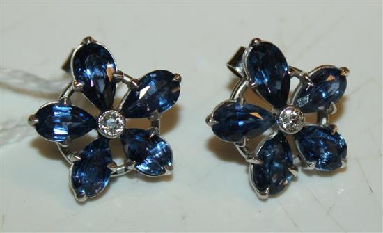 Pair of sapphire and diamond flowerhead stud earrings, white metal setting(-)